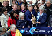 Elected officials from Bellevue, King County and the state cut the ribbon at the opening of Eastside light rail.