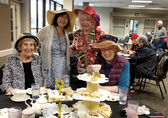 Women enjoy a tea party at the North Bellevue Community Center.
