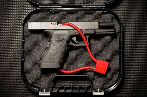 Picture of a gun with a gun lock