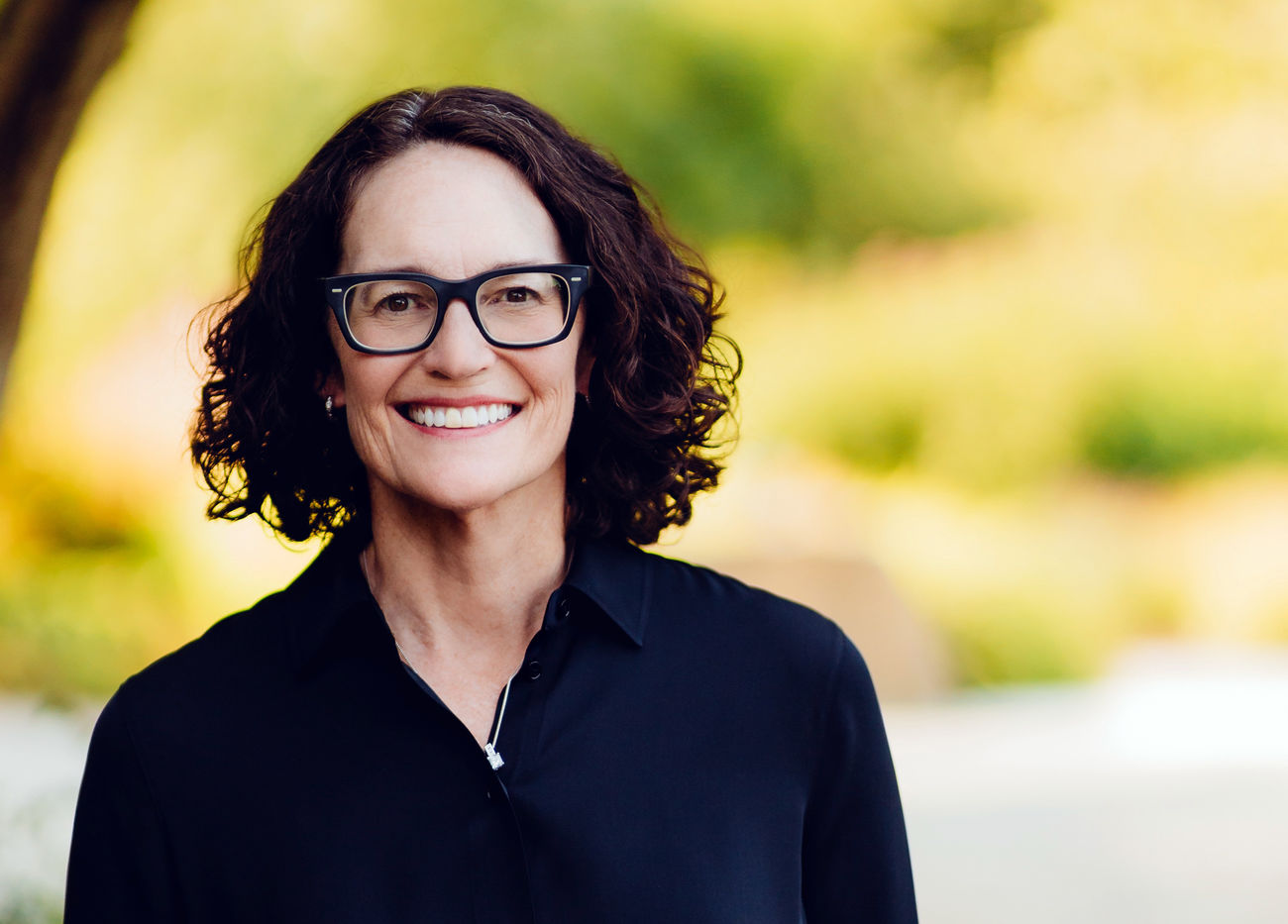 Image of Diane Carlson standing by a Bellevue street