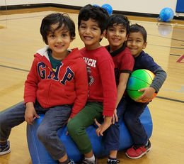 Crossroads Community Center - four Pre-K kids in gym