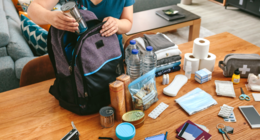 Image of a person packing an emergency kit.