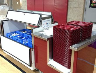 Students use reusable lunch trays instead of foam ones.